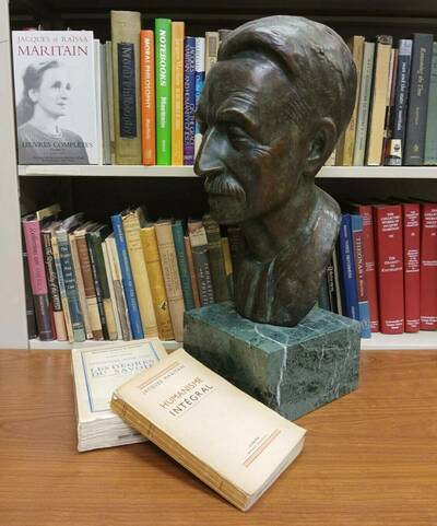 Bust of Jacques Maritain with books in front and behind